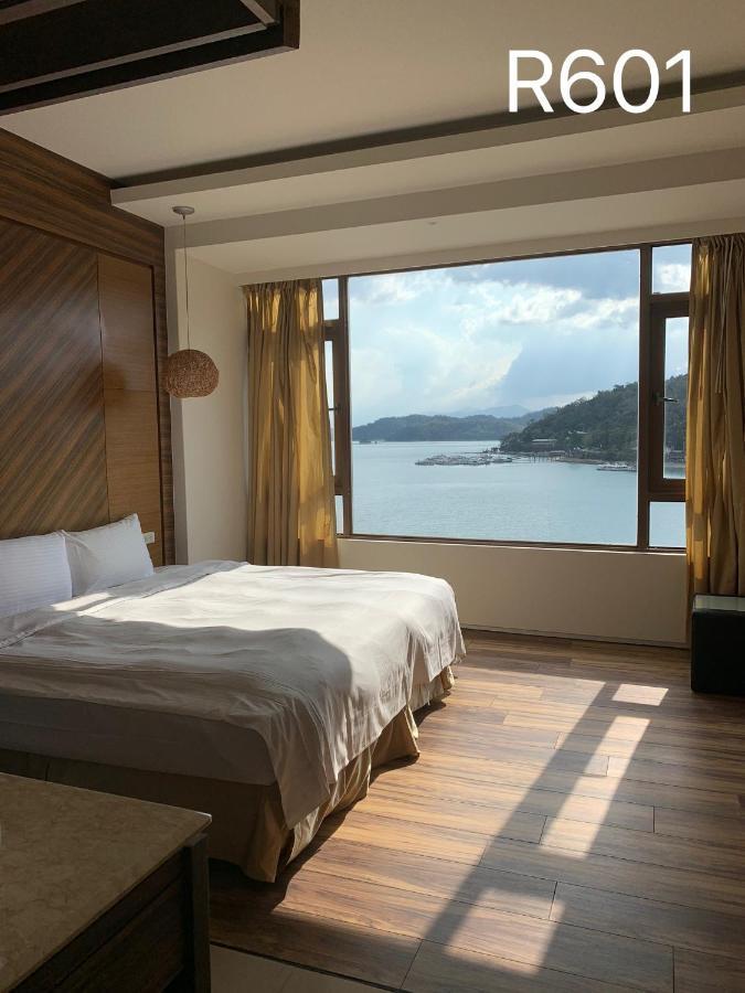 Miracolo View Hotel Yuchi Bagian luar foto
