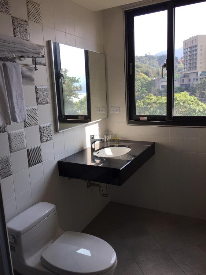 Miracolo View Hotel Yuchi Bagian luar foto