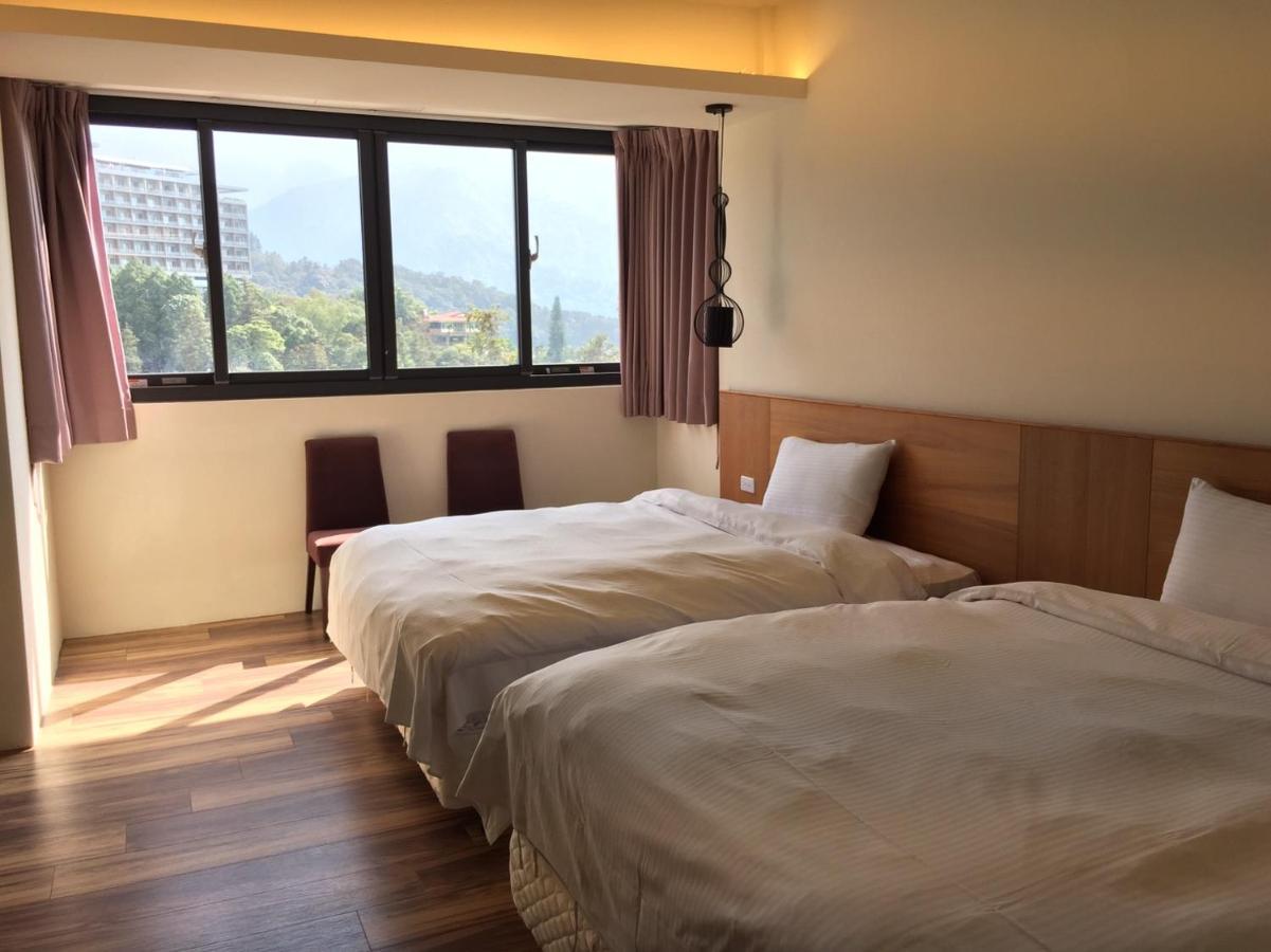 Miracolo View Hotel Yuchi Bagian luar foto