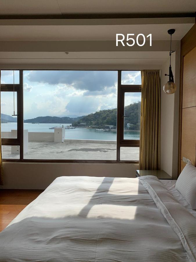 Miracolo View Hotel Yuchi Bagian luar foto