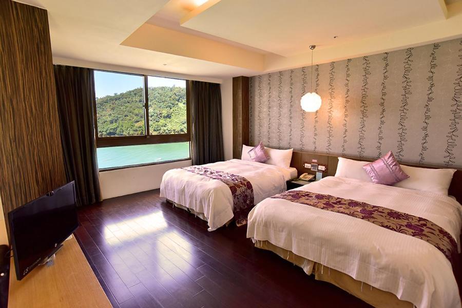 Miracolo View Hotel Yuchi Bagian luar foto