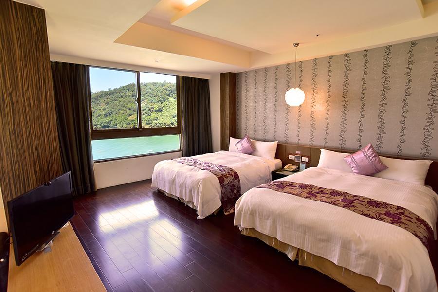 Miracolo View Hotel Yuchi Bagian luar foto