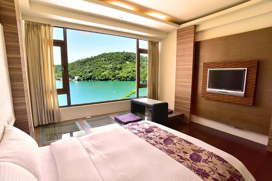Miracolo View Hotel Yuchi Bagian luar foto