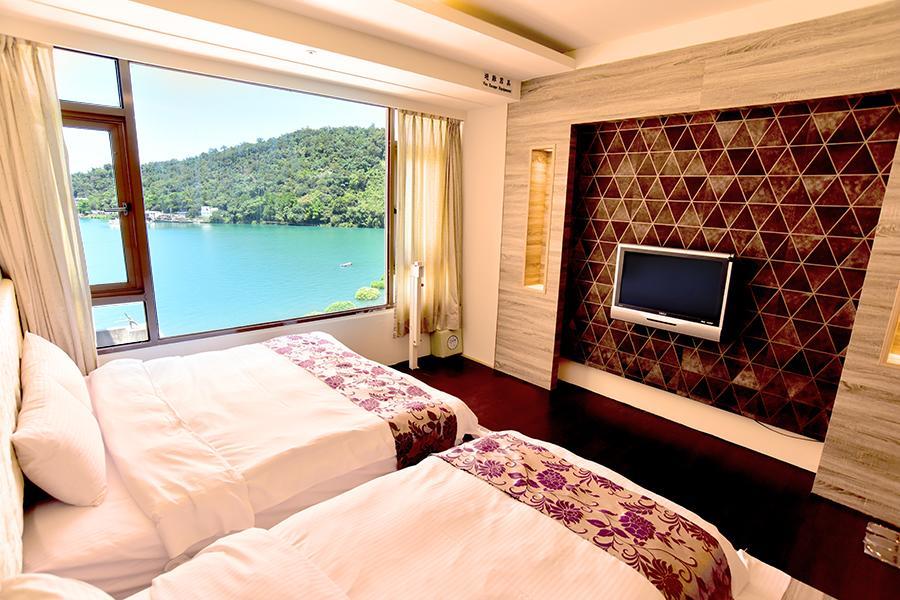 Miracolo View Hotel Yuchi Bagian luar foto