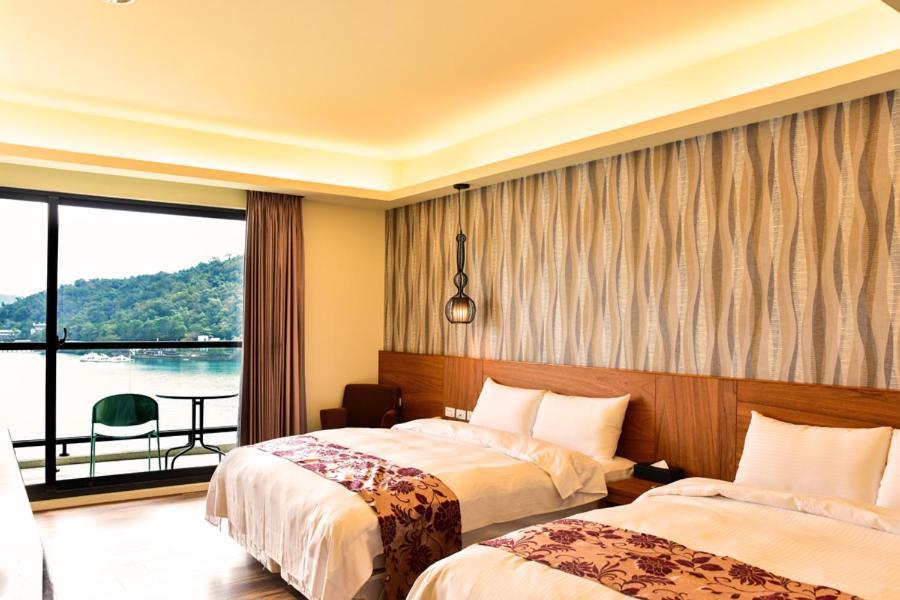 Miracolo View Hotel Yuchi Bagian luar foto