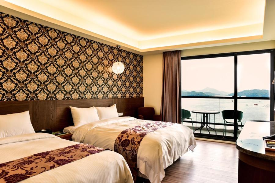 Miracolo View Hotel Yuchi Bagian luar foto