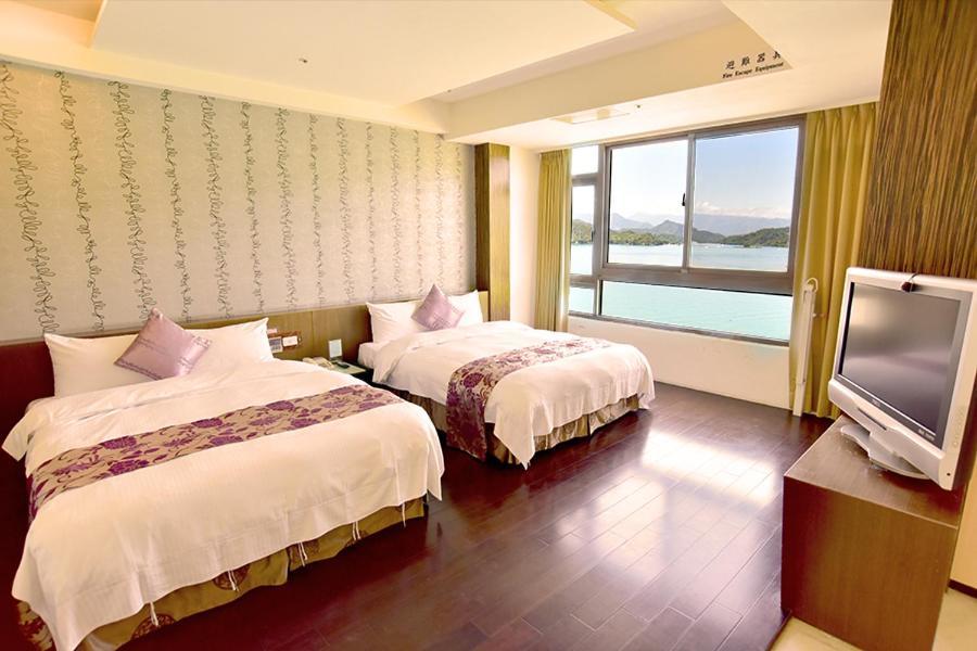 Miracolo View Hotel Yuchi Bagian luar foto