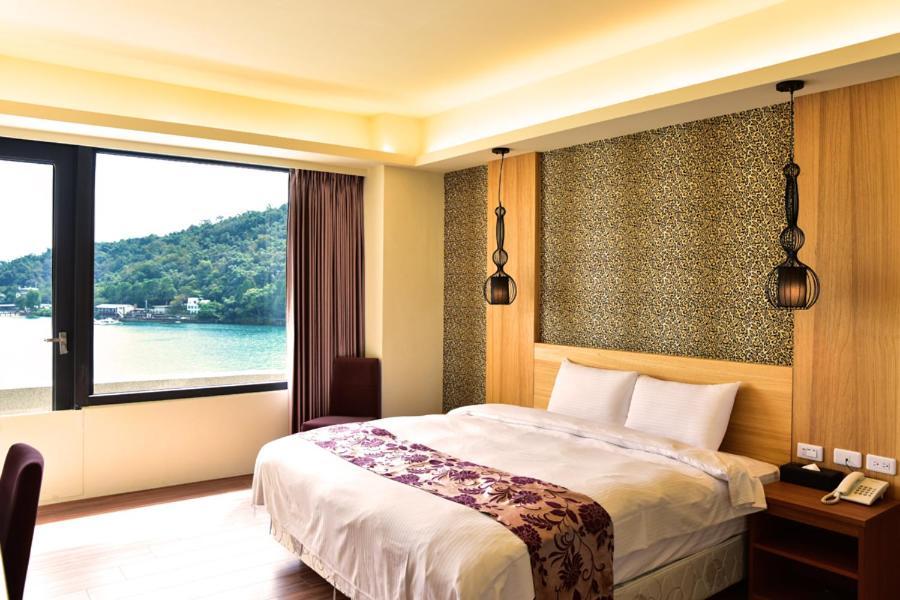 Miracolo View Hotel Yuchi Bagian luar foto