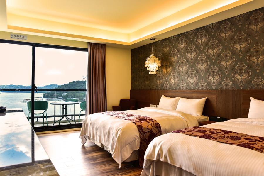 Miracolo View Hotel Yuchi Bagian luar foto