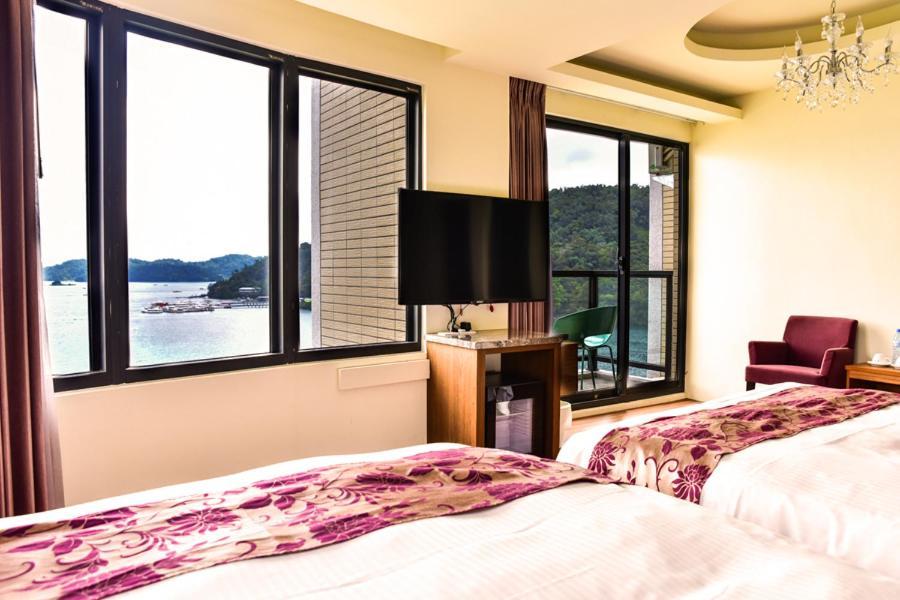 Miracolo View Hotel Yuchi Bagian luar foto